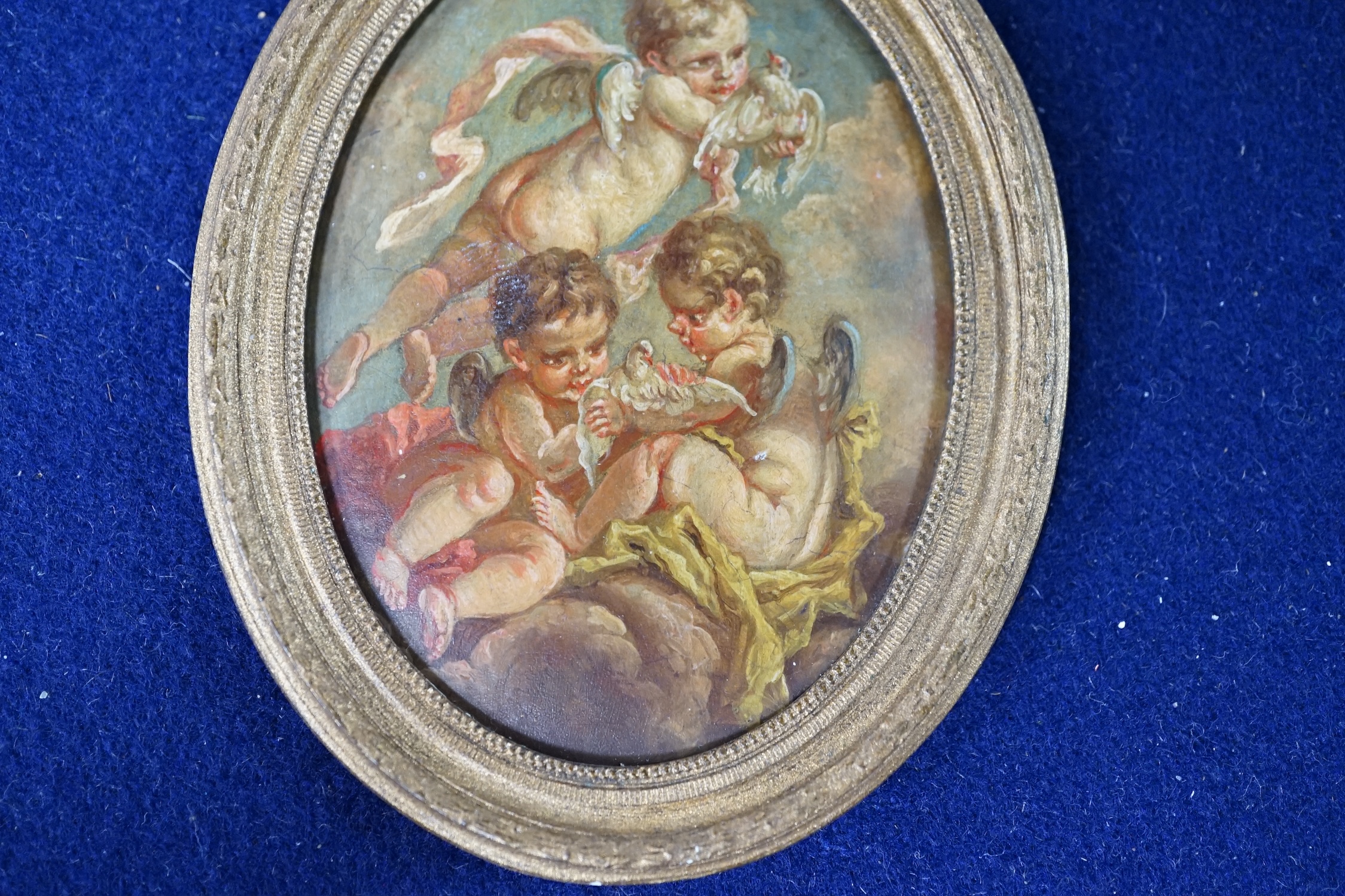 18th/19th century school, miniature oval oil on copper of Amorini, gilt framed, 7.5 x 5.5cm. Condition - fair to good